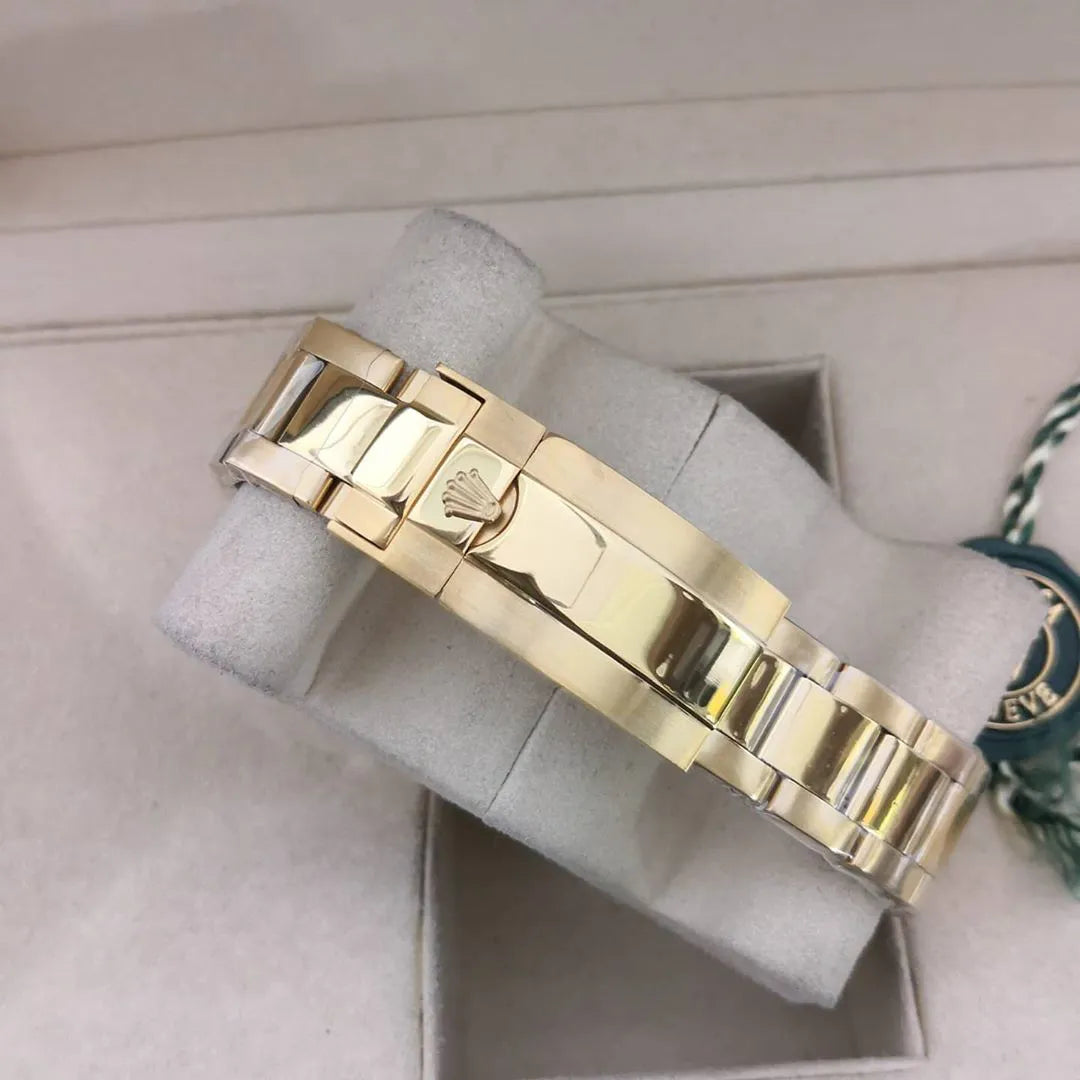 Rolex Submariner Jubilee Gold / Blau